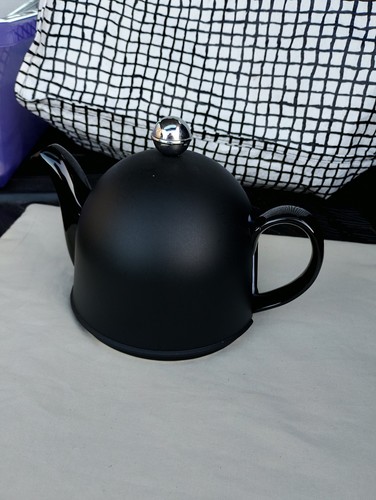 Black teapot with - its, own